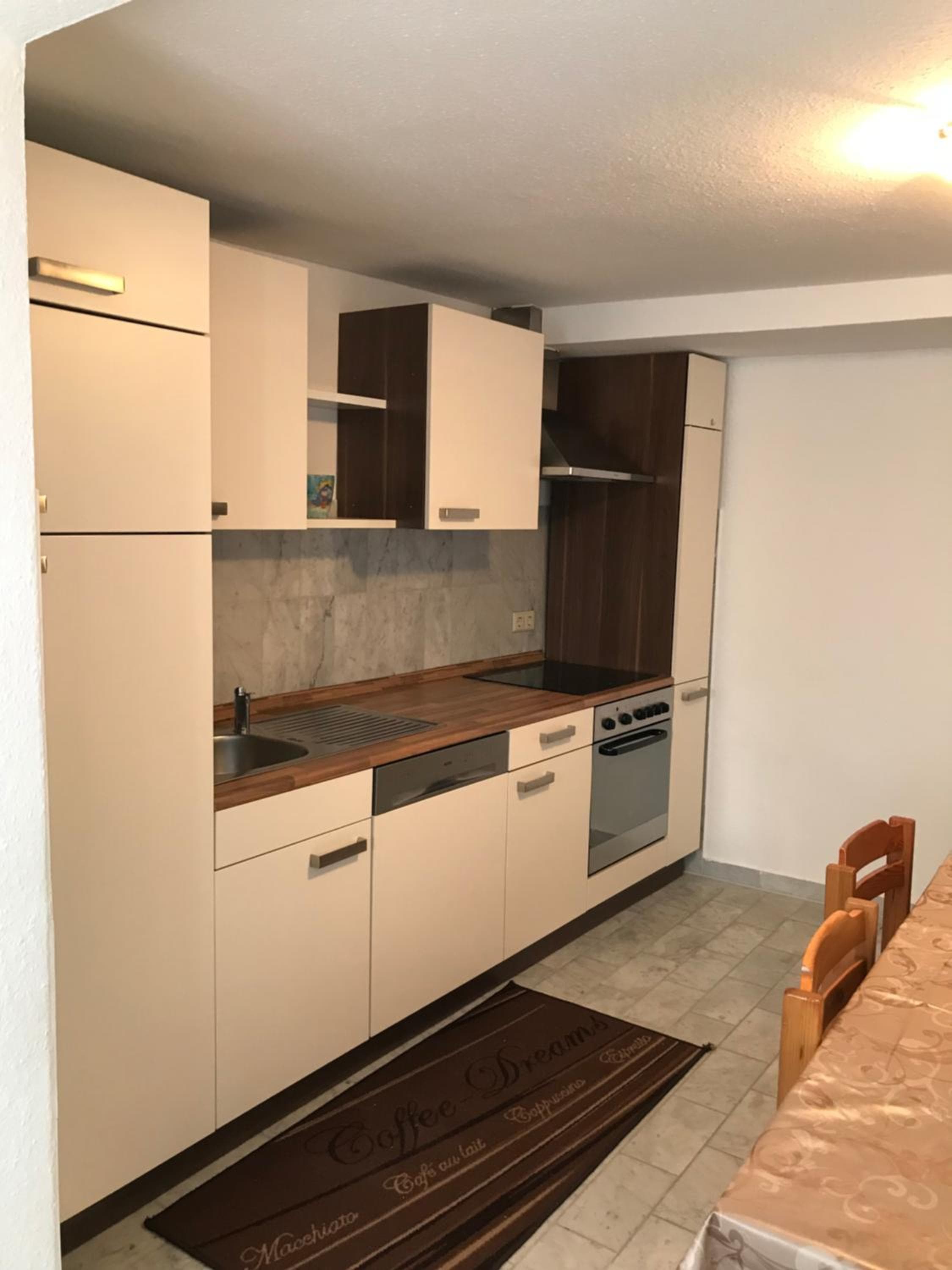 Kitchen at Stadt Apartment