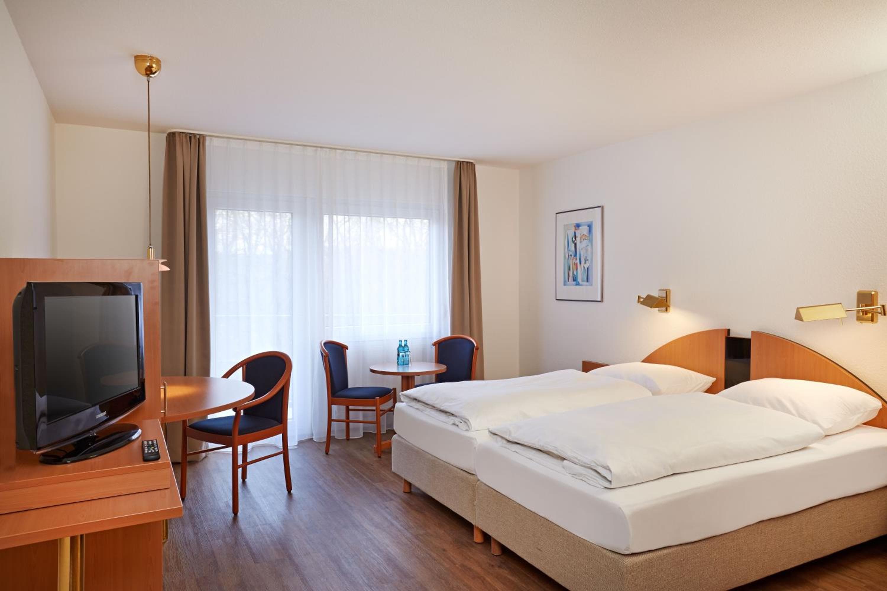 Hotel room at Sunday Hotel Wiesbaden Niedernhausen Apartments