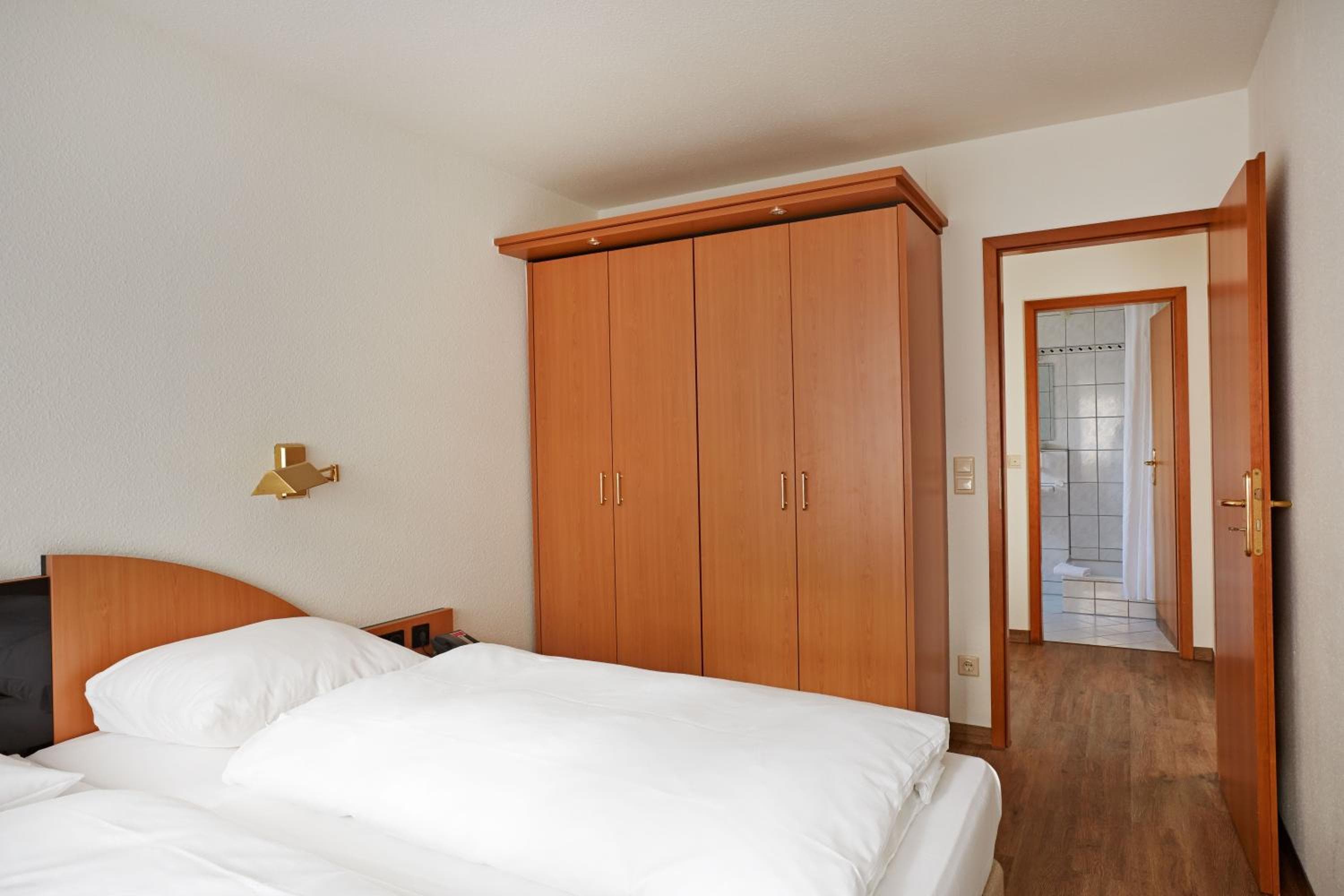 Hotel room at Sunday Hotel Wiesbaden Niedernhausen Apartments