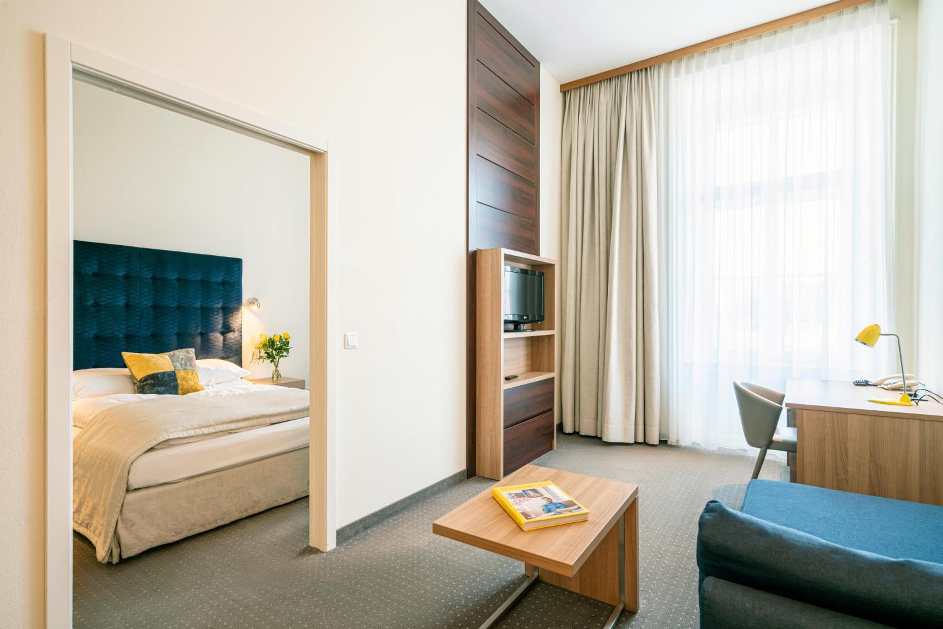 Hotel room at HiLight Suites Hotel