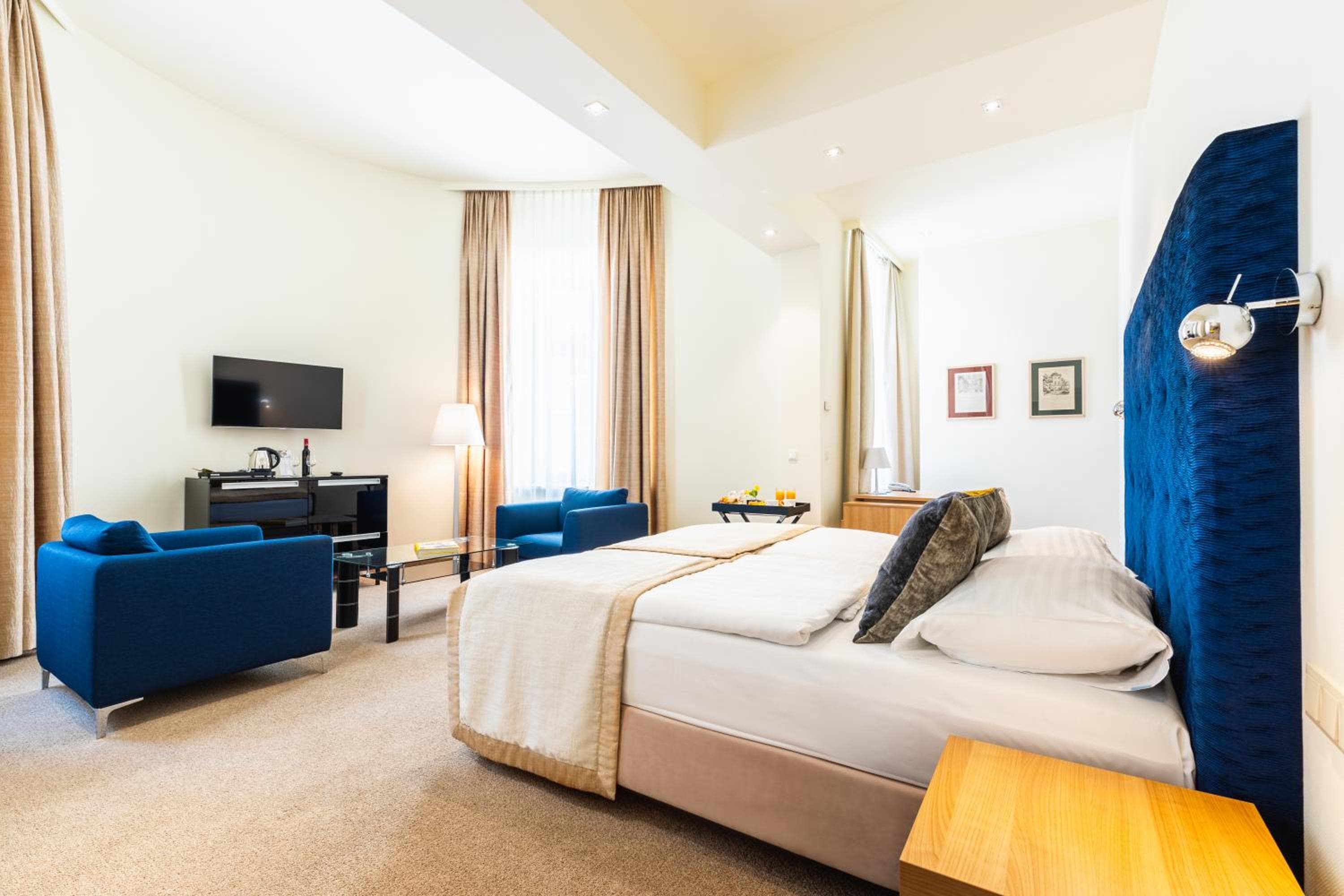 Hotel room at HiLight Suites Hotel