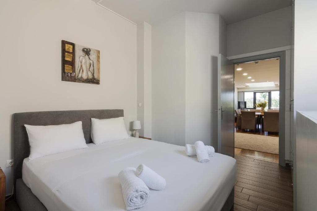 Bedroom at Arditou Akropolis Apartments-Suites