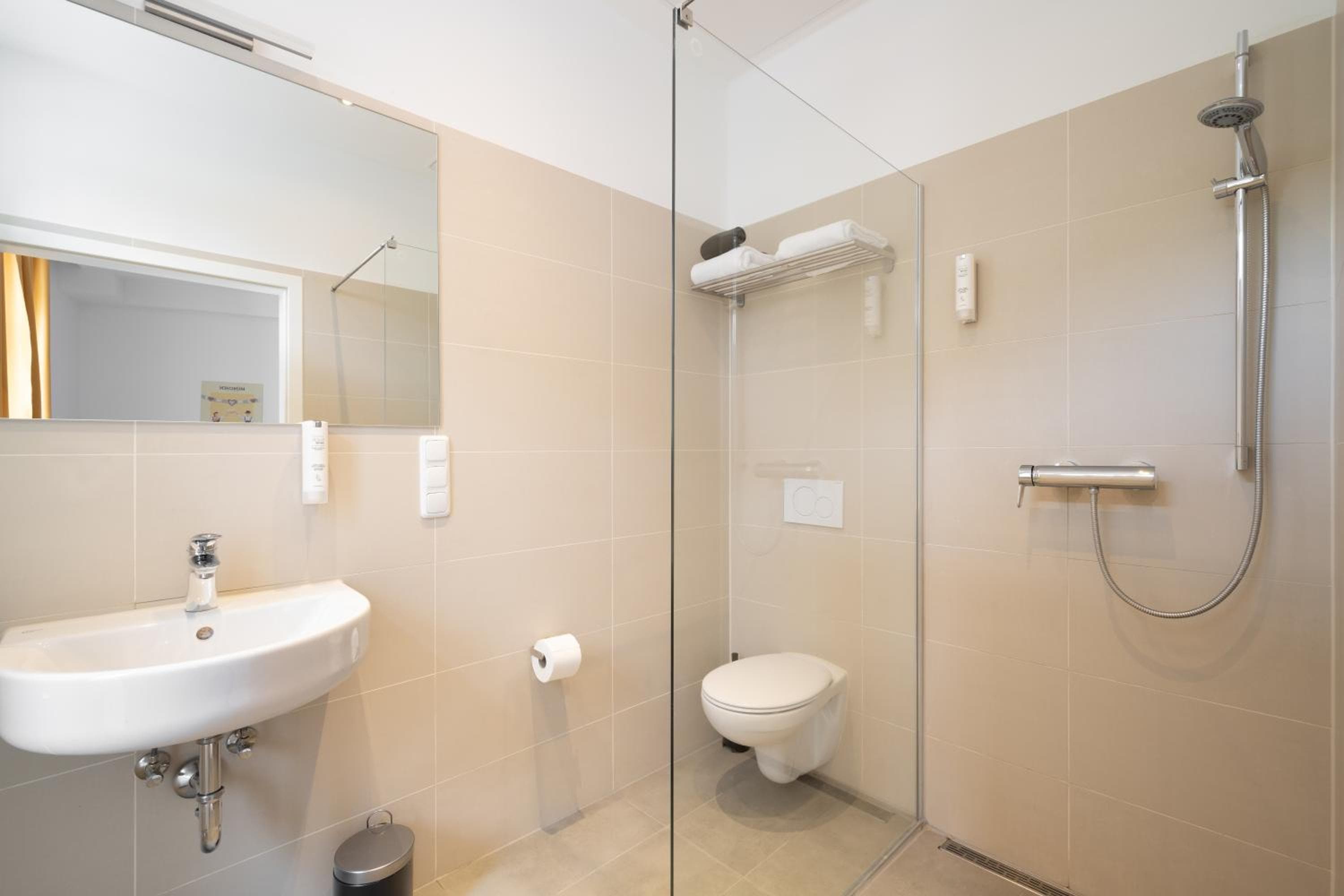 Bathroom at Servus Apartments by Homaris