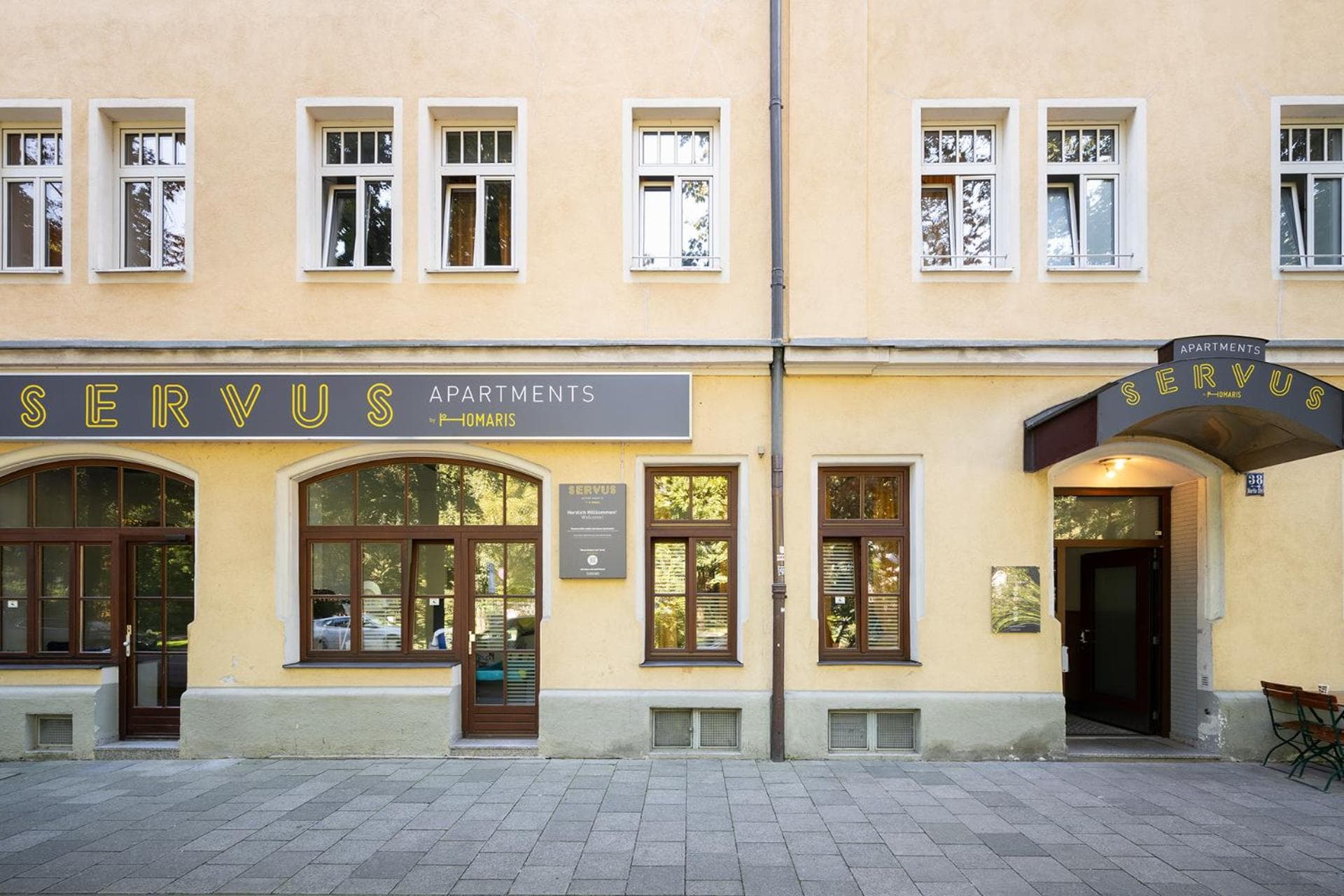 Building at Servus Apartments by Homaris