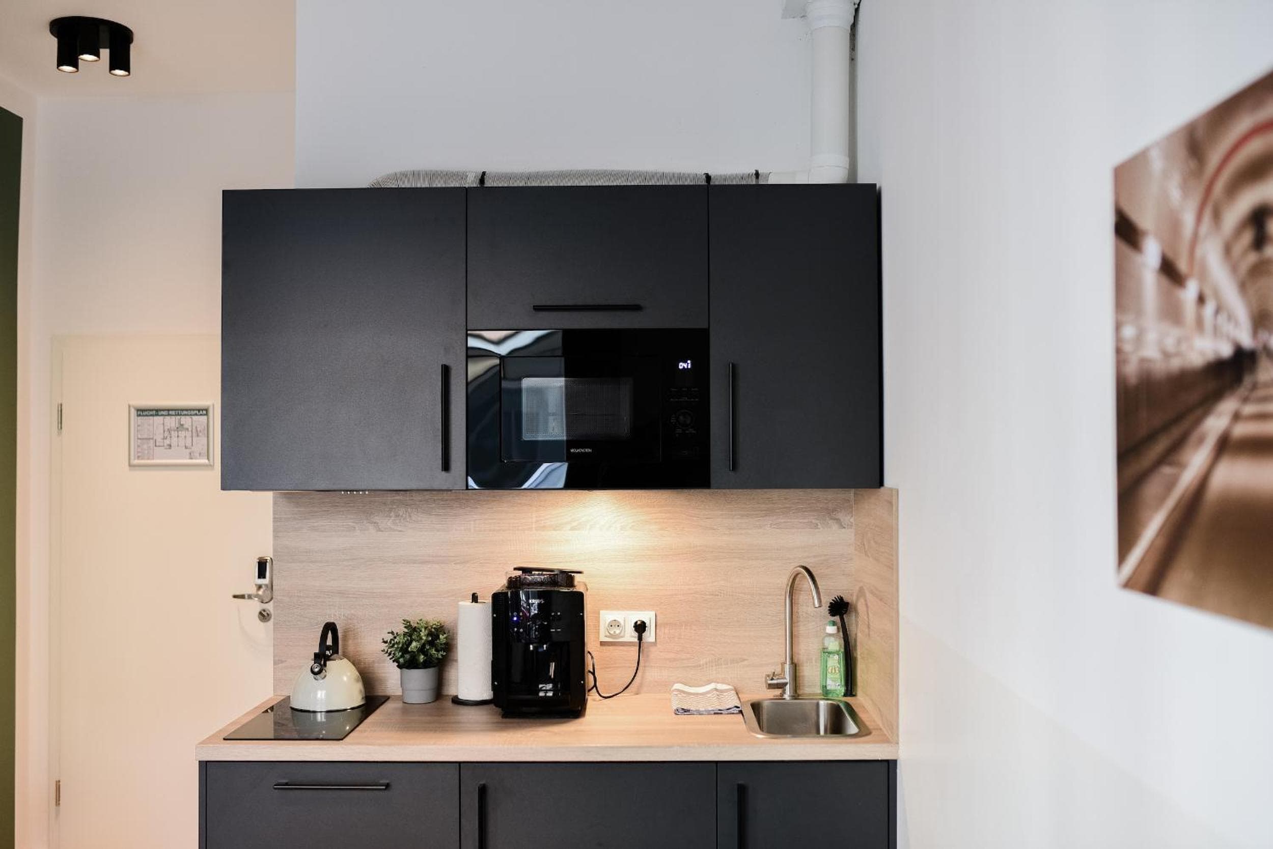 Kitchen at Homaris Apartments Elmshorn