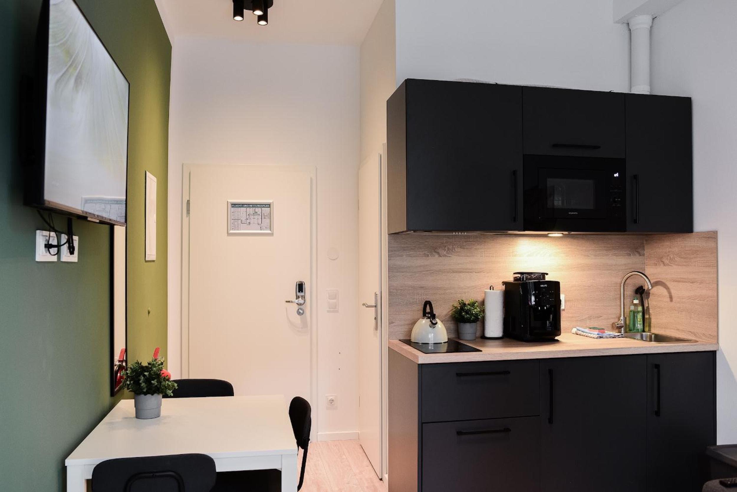 Kitchen at Homaris Apartments Elmshorn