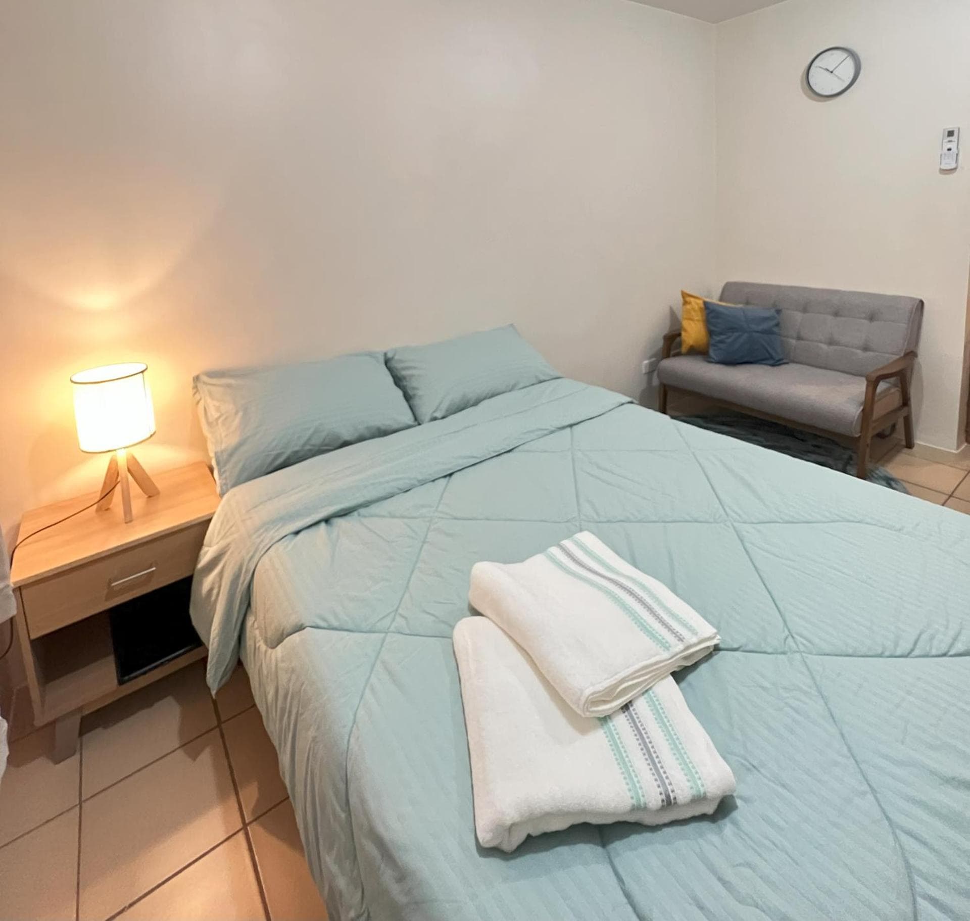 Hotel room at New 8 Spatial Davao Smart Studio Unit Netflix Wi-Fi Amazon Voice Controlled Lights