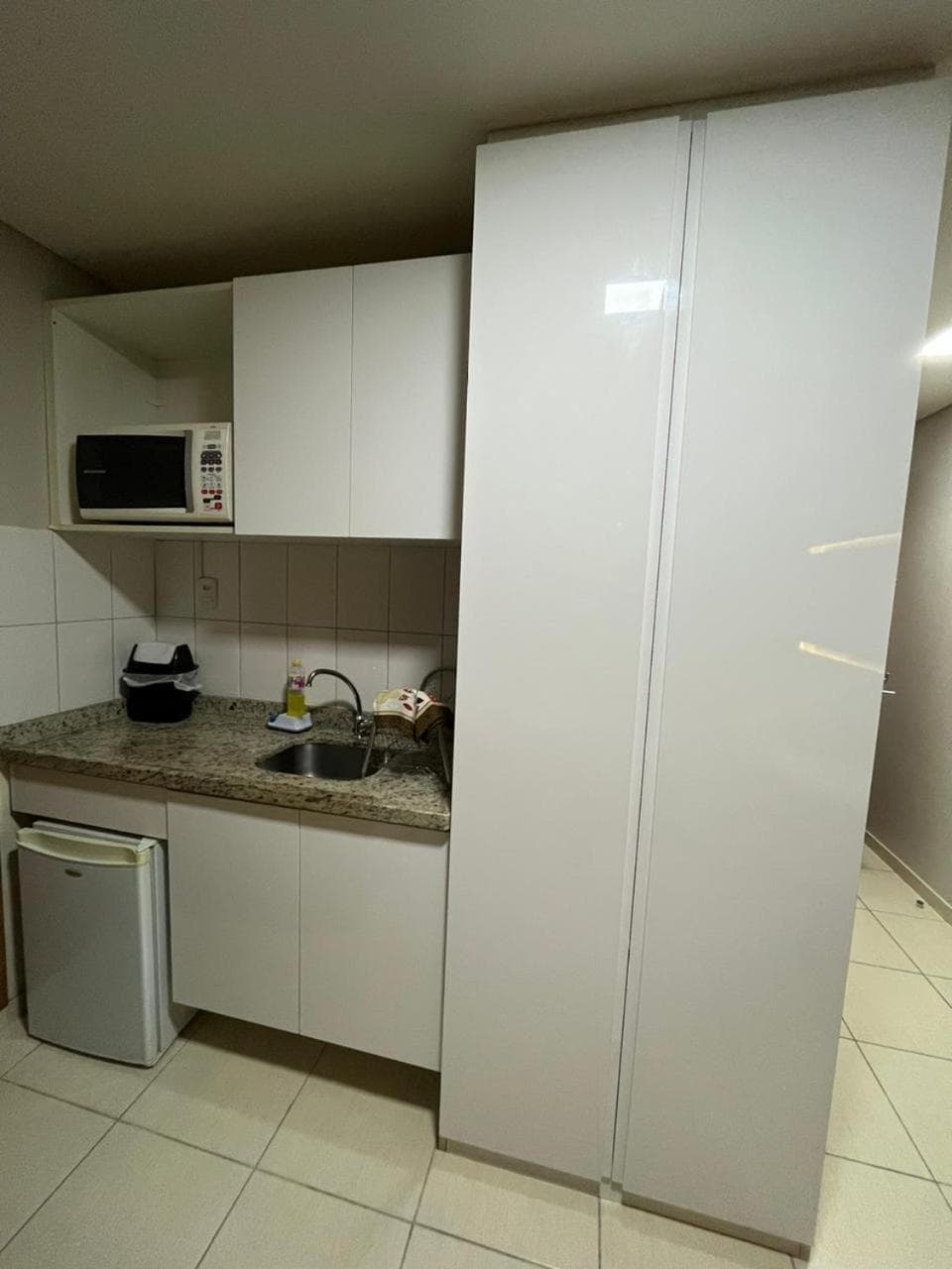 Suíte luxo com tela de cinema no América Towers Studio Residence, Salvador