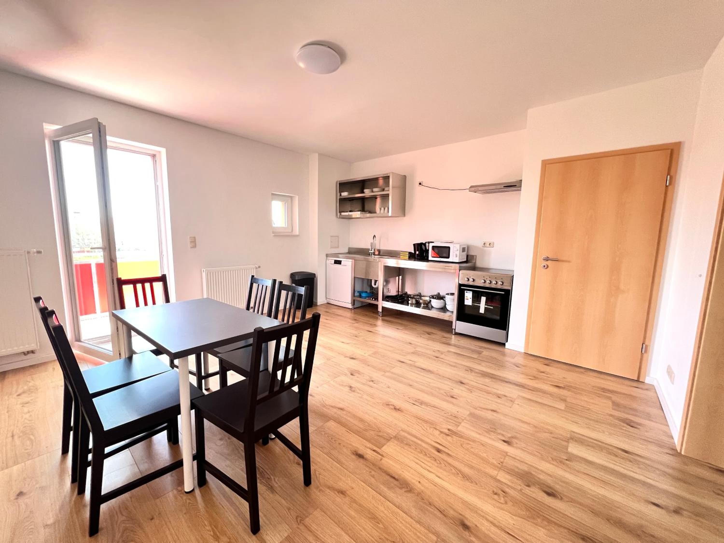 Kitchen at monteurzimmerKING: Magdeburg Dodendorfer Straße