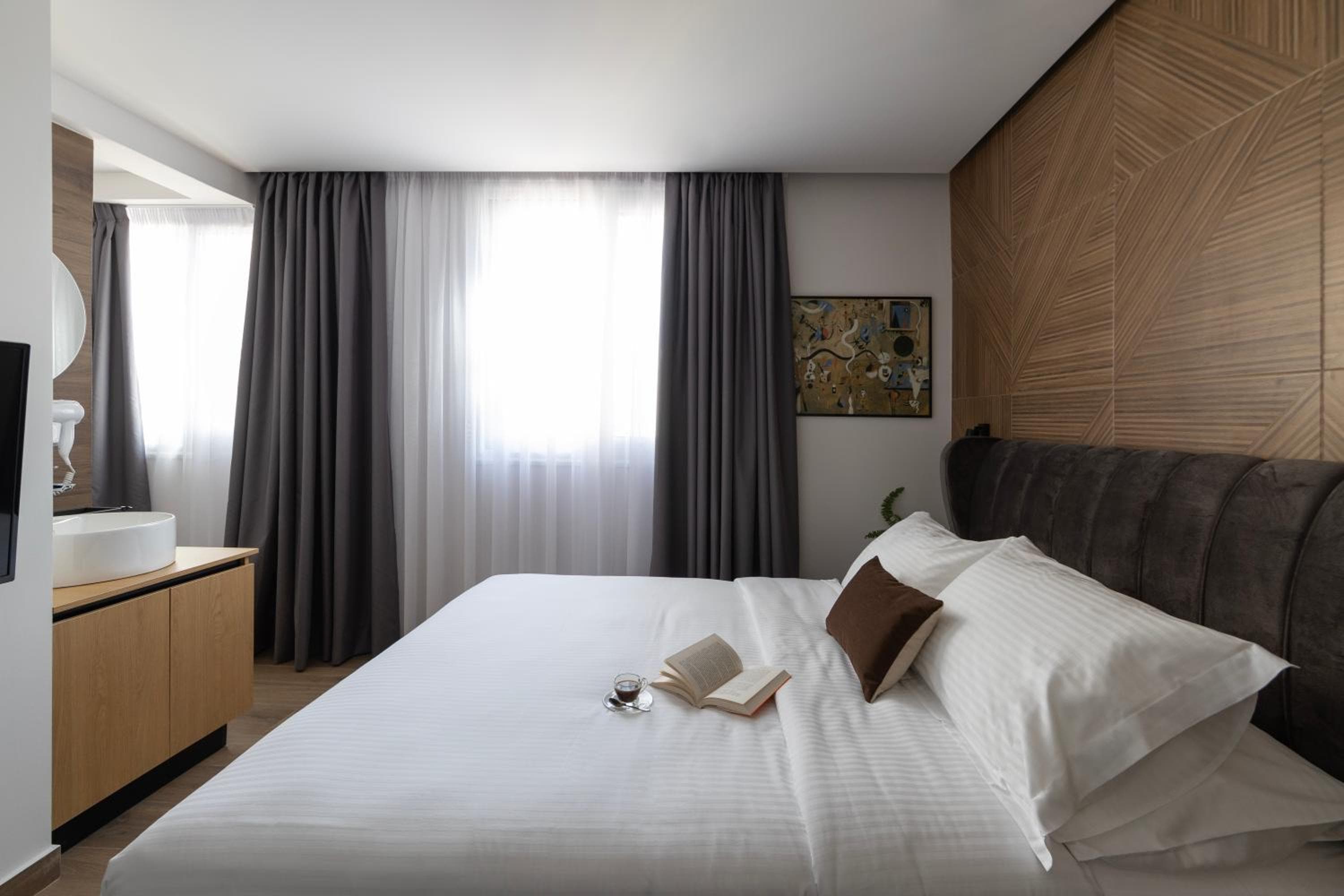 Bedroom at DOMIOS Suites Athens