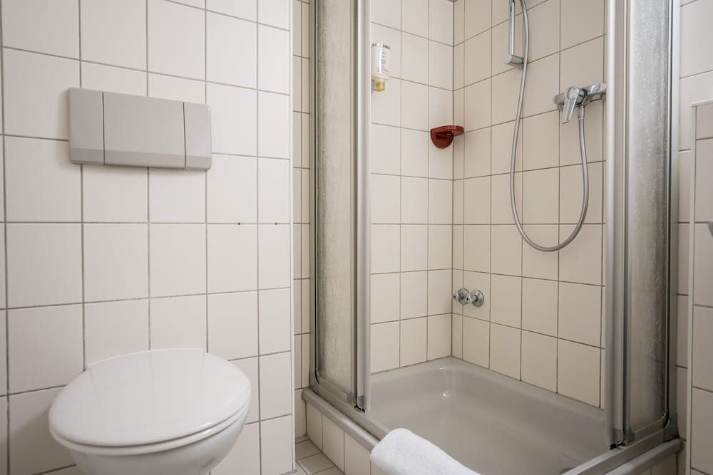 Bathroom at Point Hotel Apartments & Rooms