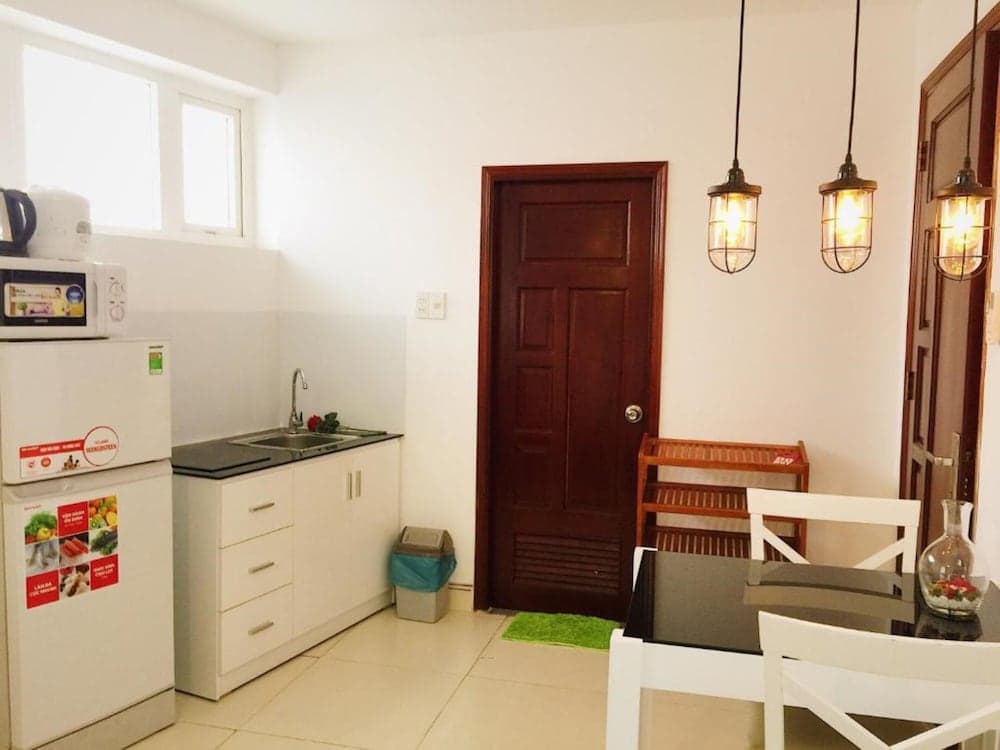 Kitchen at M-H Apartment Hotel