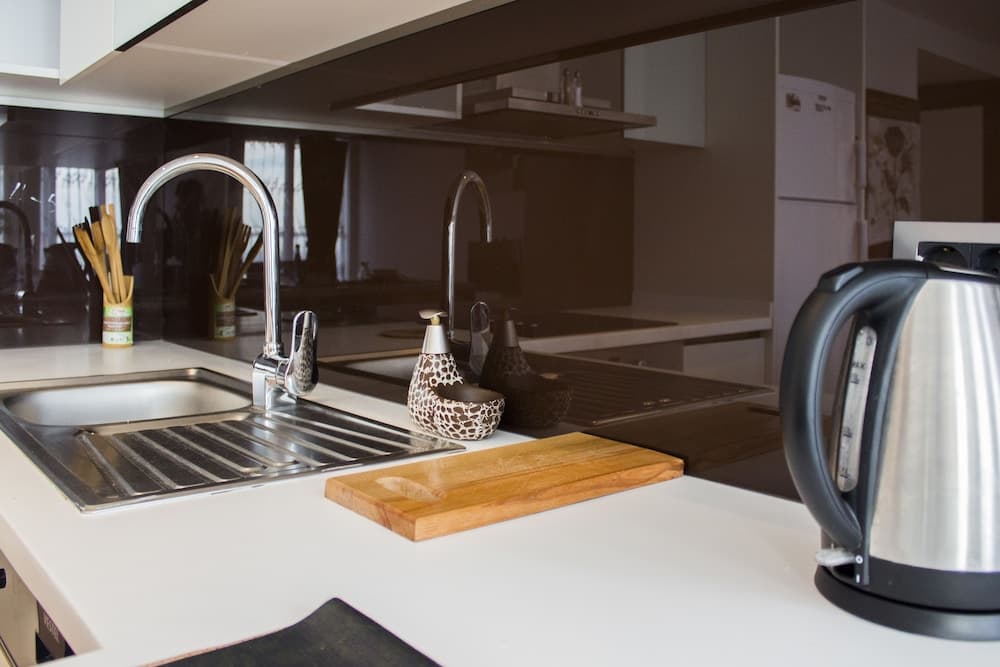 Kitchen at Koza Suites & Apartments