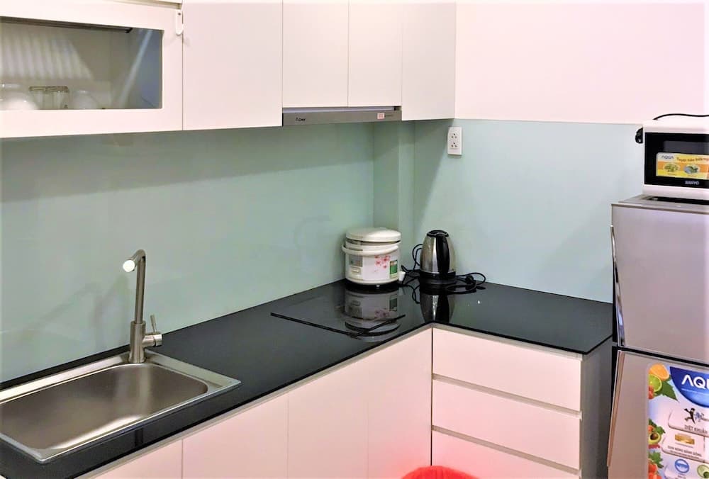 Kitchen at M-H Apartment Hotel