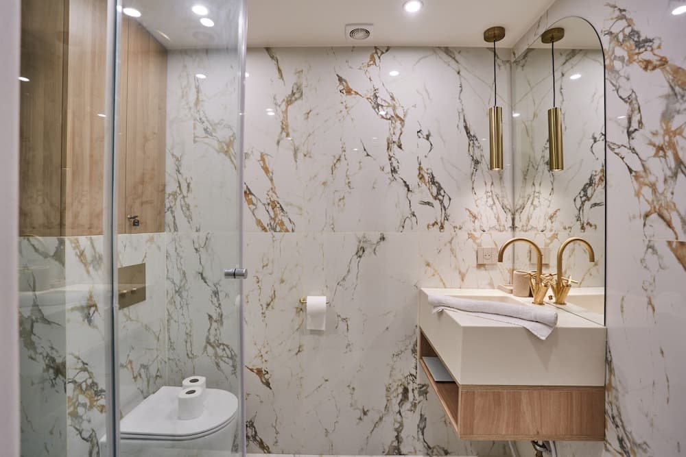 Bathroom at Apart Hotel Centre de Paris by Studio prestige