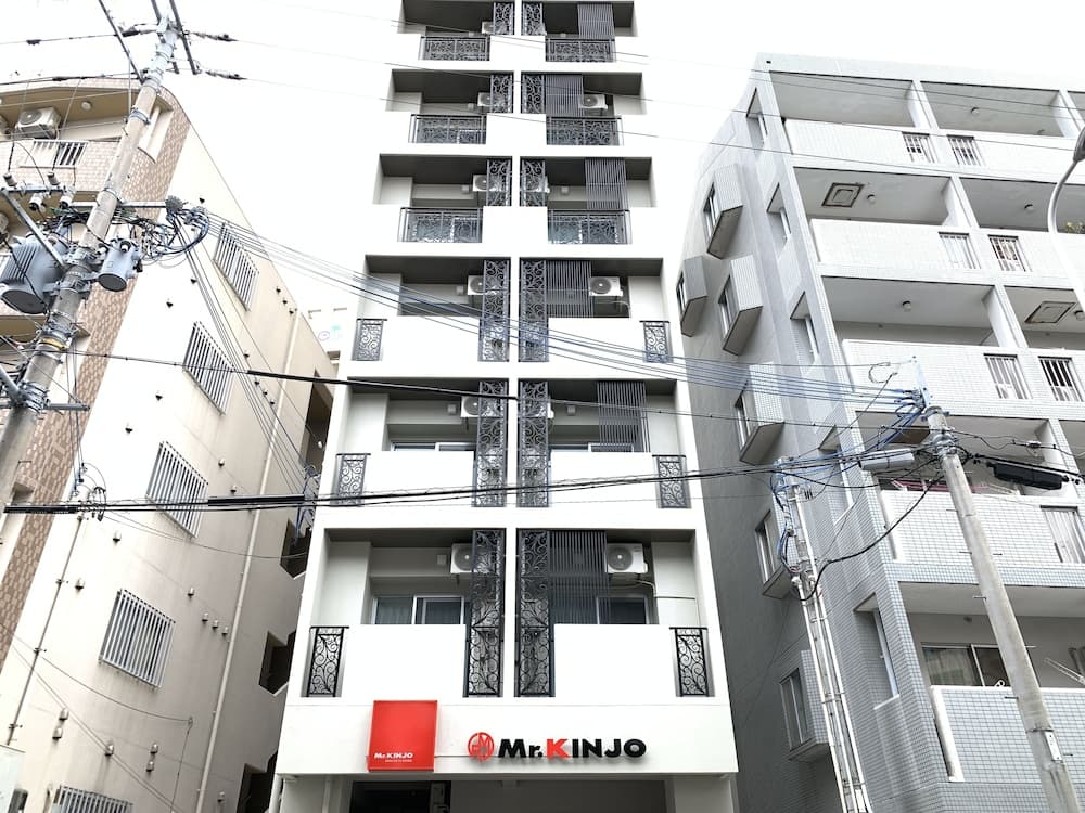 Mr.KINJO Miki24 in front of Makishi Station, Naha