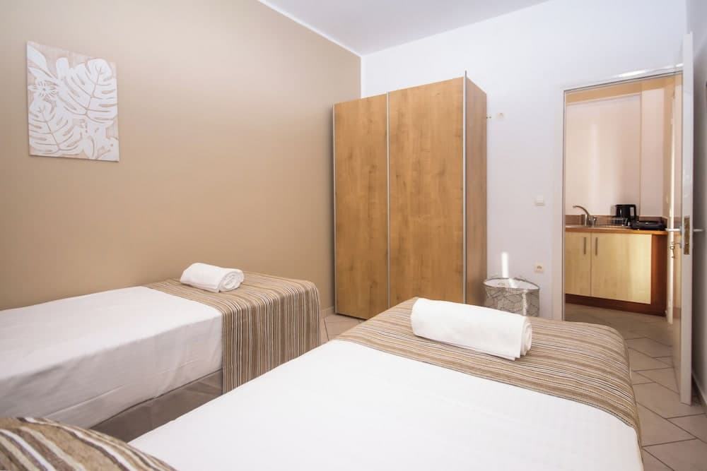 Bedroom at Infinity Wellness Apartment Hotel