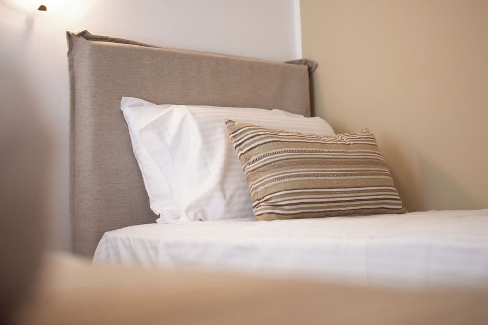 Bedroom at Infinity Wellness Apartment Hotel