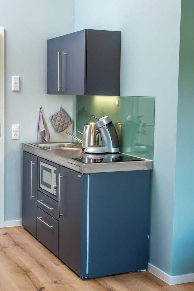 Kitchen at triple a Apartments in Altfeld