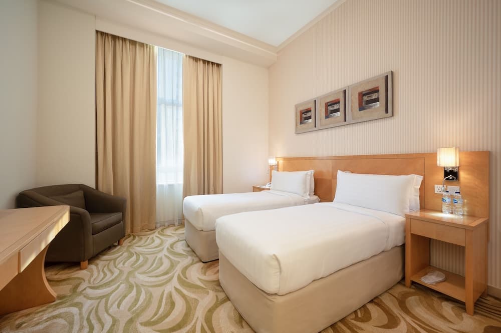 Hotel room at Oaks Liwa Heights Suites