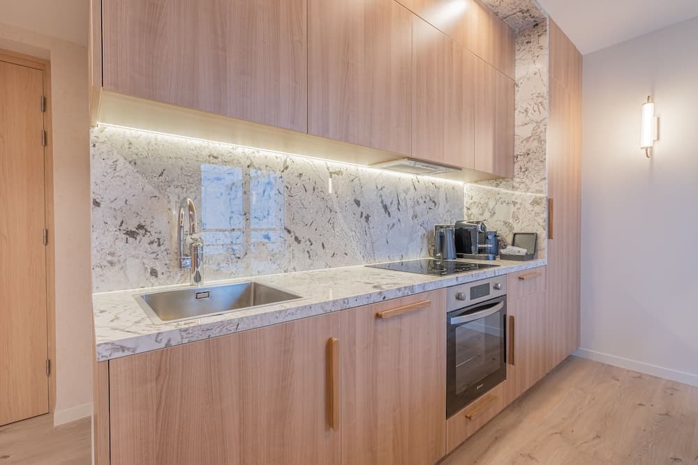Kitchen at Yuna Porte Maillot - ApartHotel