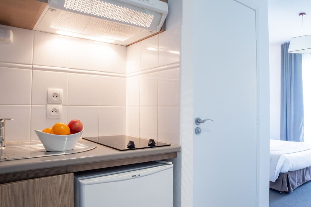Kitchen at Comfort Aparthotel Cannes Mandelieu