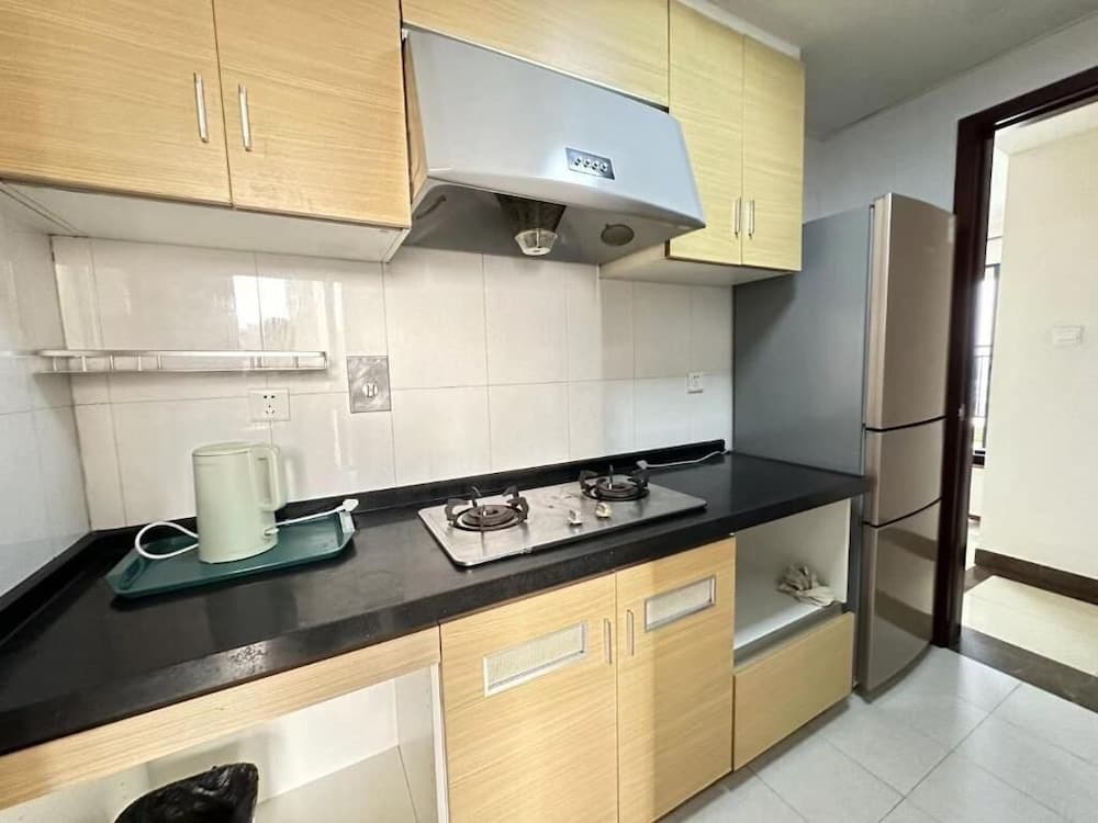Kitchen at Guangzhou Phantom Oasis Apartments - Canton Fair Exhibition Center