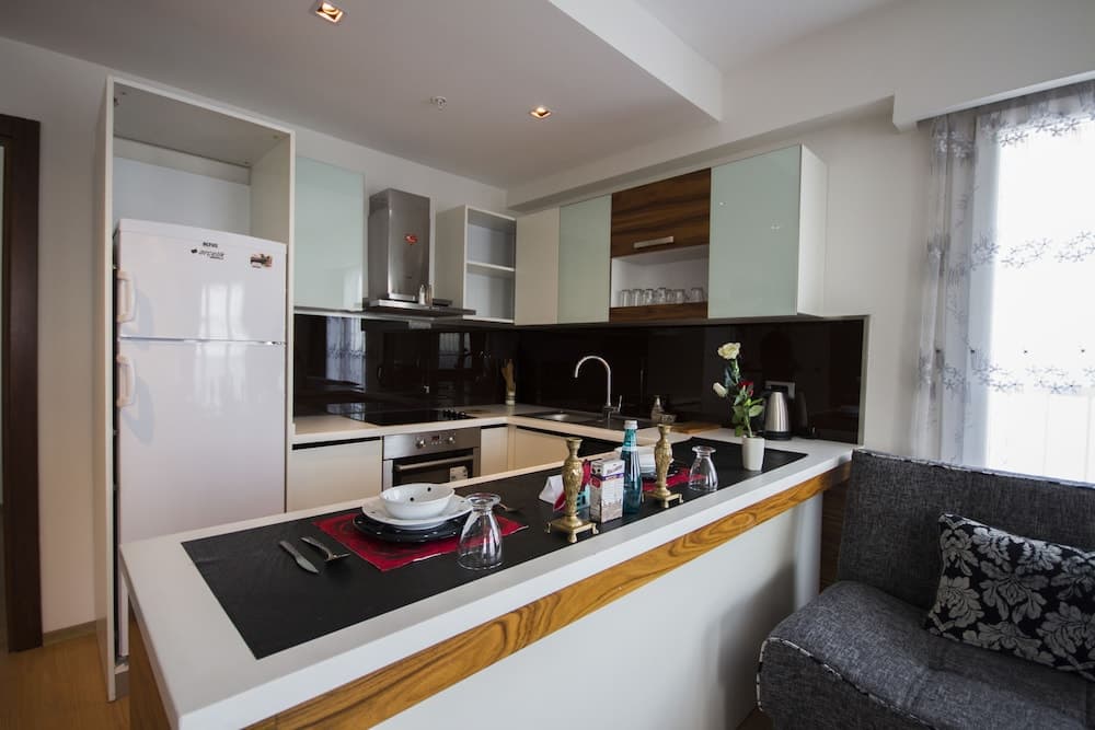 Kitchen at Koza Suites & Apartments