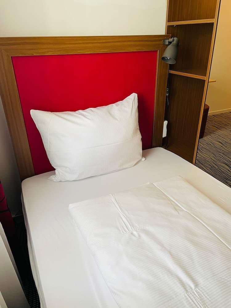 Bedroom at Point Hotel Apartments & Rooms